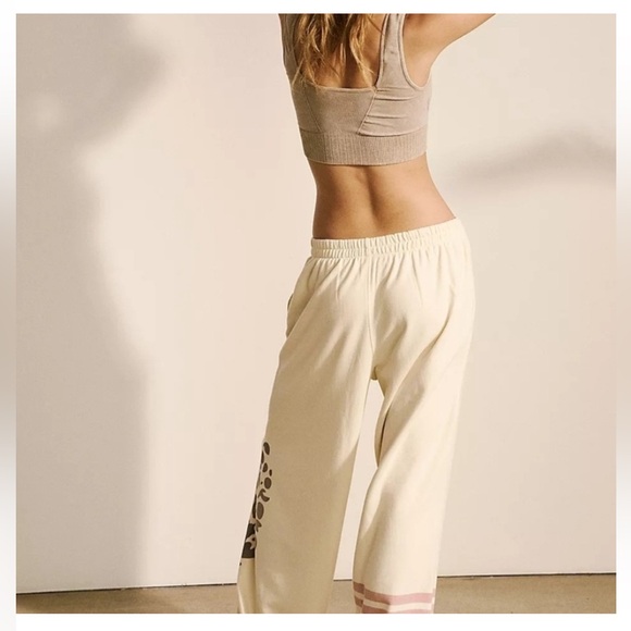 Free People Movement All Star Logo Pants in a cream color. - Picture 2 of 9